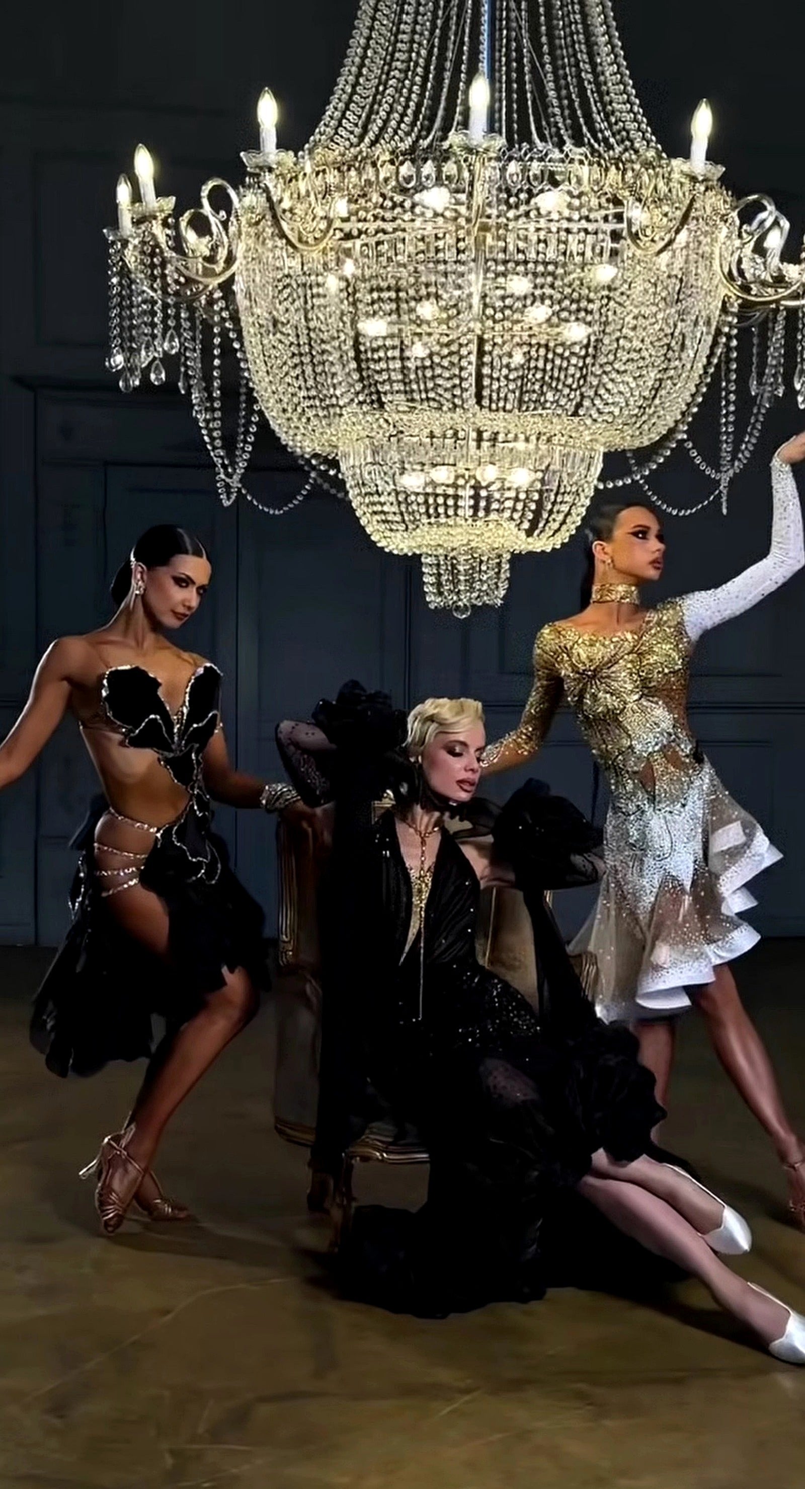 Ballroom dresses under chandelier